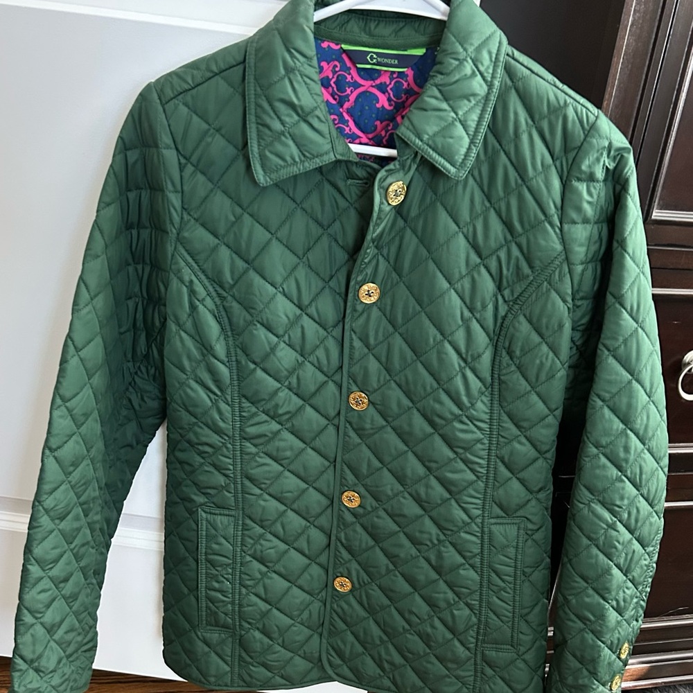 C. Wonder Green Quilted Jacket with Pink and Blue Lining